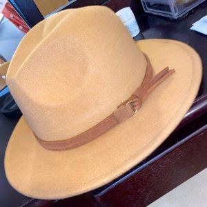Tan, wide brim, Panama hat, suede with brown buckle